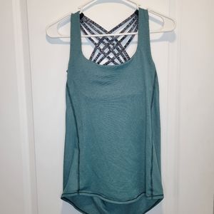 Lululemon Size 4 Free to Be *Wild 2-in-1 Tank. It's green with gray in color.